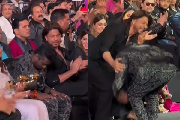 ஷாருக்கான் காலில் விழுந்த பிரபல இயக்குனர்!