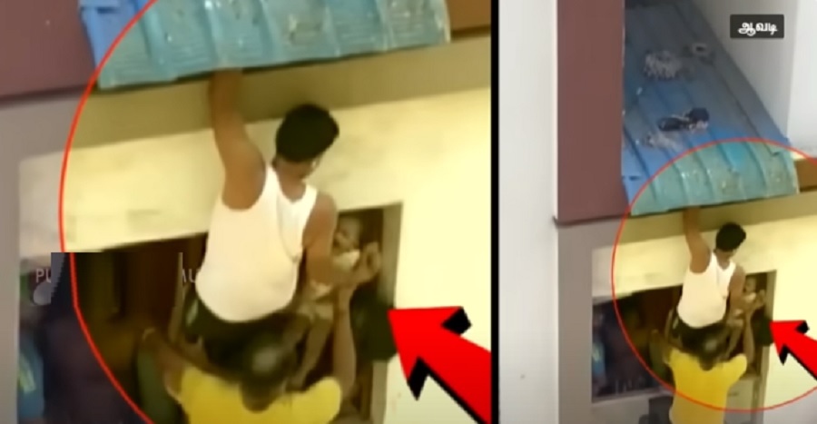 அடுக்குமாடி கூரையில் சிக்கிய குழந்தையை மீட்ட இளைஞர்கள்!