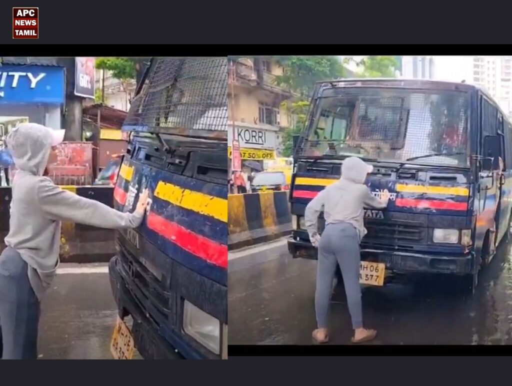 மும்பையை உலுக்கிய ஒரு புகைப்படம்: கைது வாகனத்தின் முன் ஒற்றைப் பெண்ணாக நின்று சாதித்த இளம்பெண்!