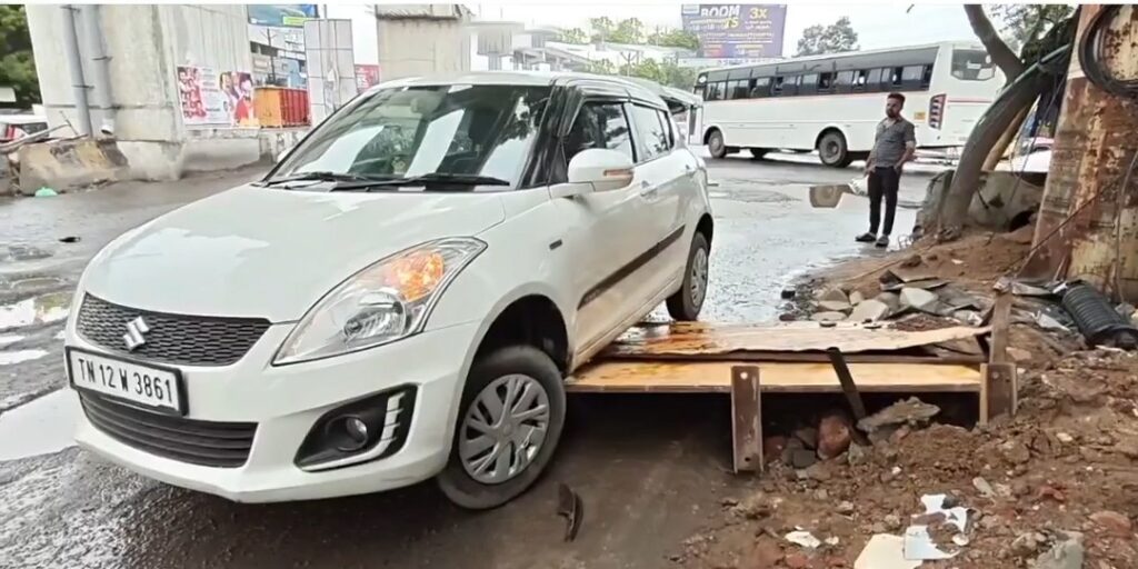 மழையால் சேதமடைந்த சாலை: சரிந்து கிடந்த பேரிகார்டு மீது மோதி கார் விபத்து – பூந்தமல்லியில் பரபரப்பு!